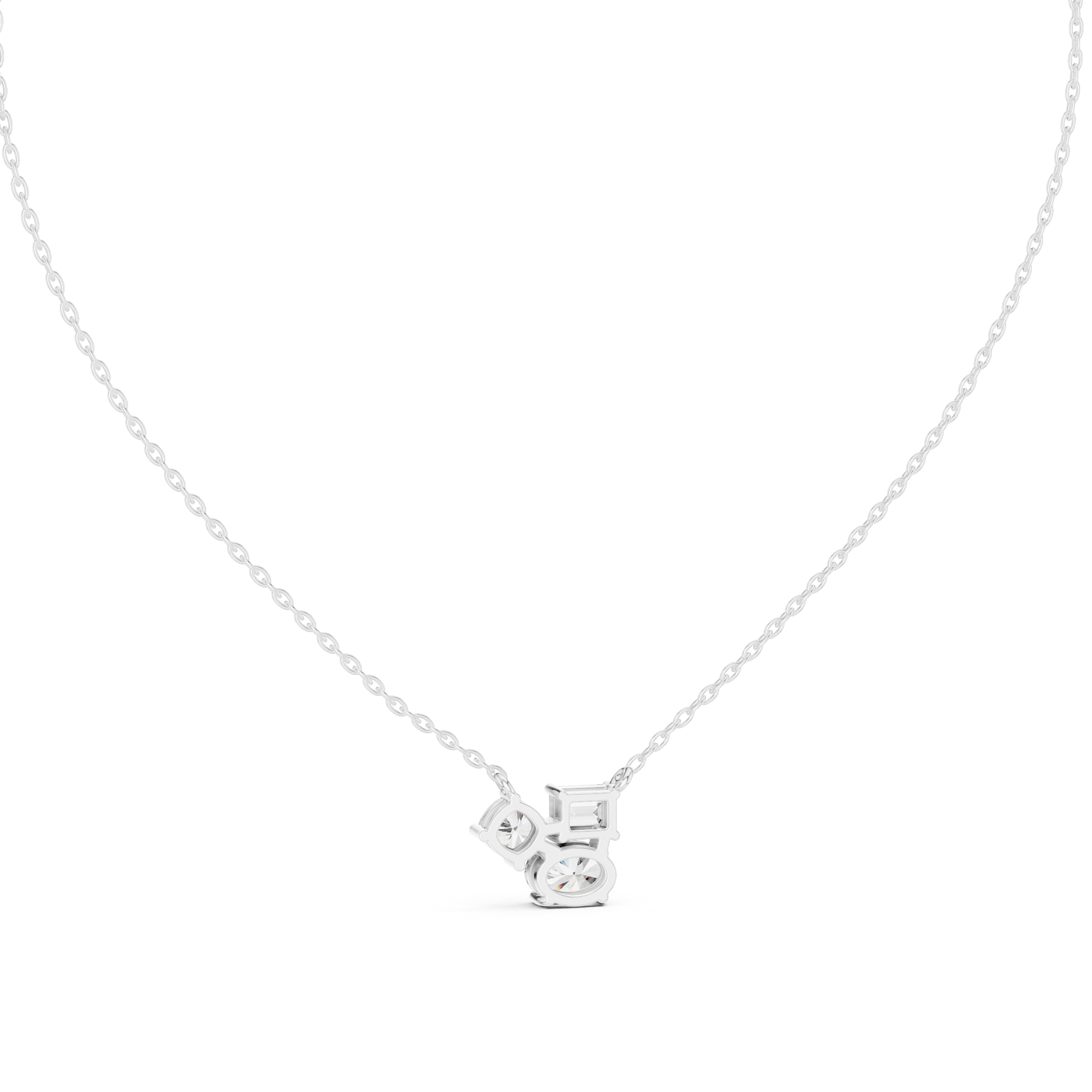Multi shape cluster diamond pendant necklace with emerald, round and cushion cut stones