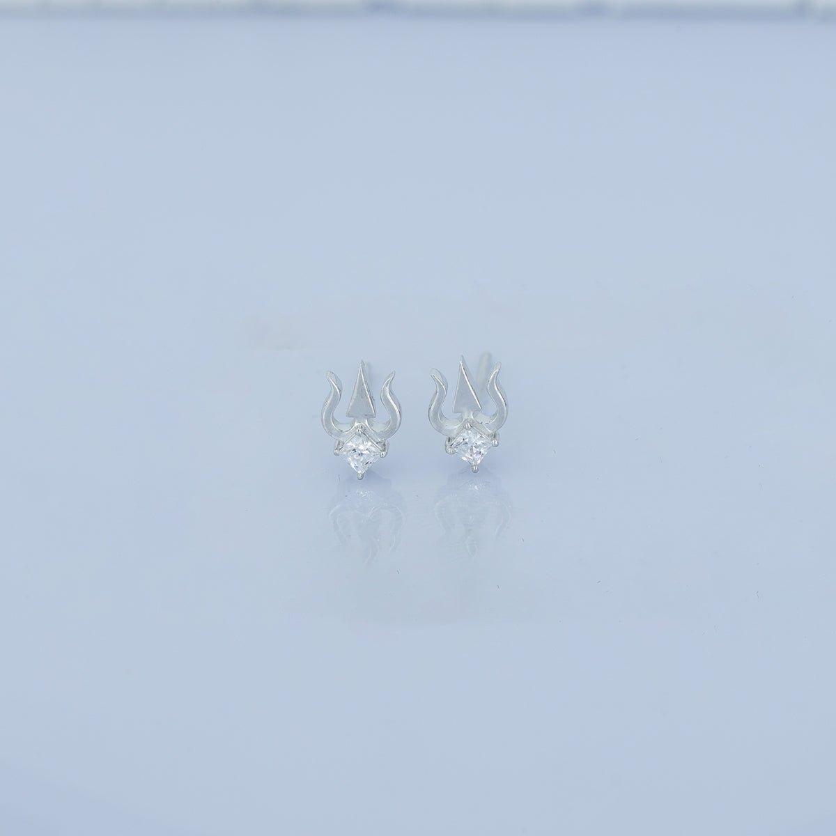 Trishul stud earrings with sacred trident motif and square stone centre