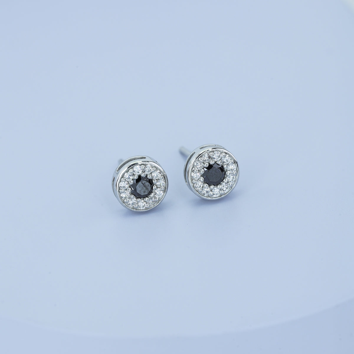 Black halo round cluster stud earrings with white pave surround and circular bezel frame