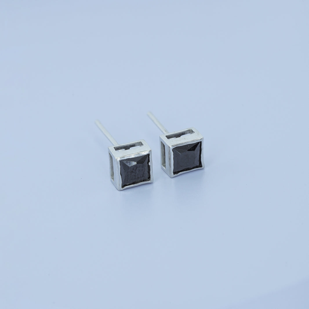 Black princess bezel stud earrings with channel set flat square frame