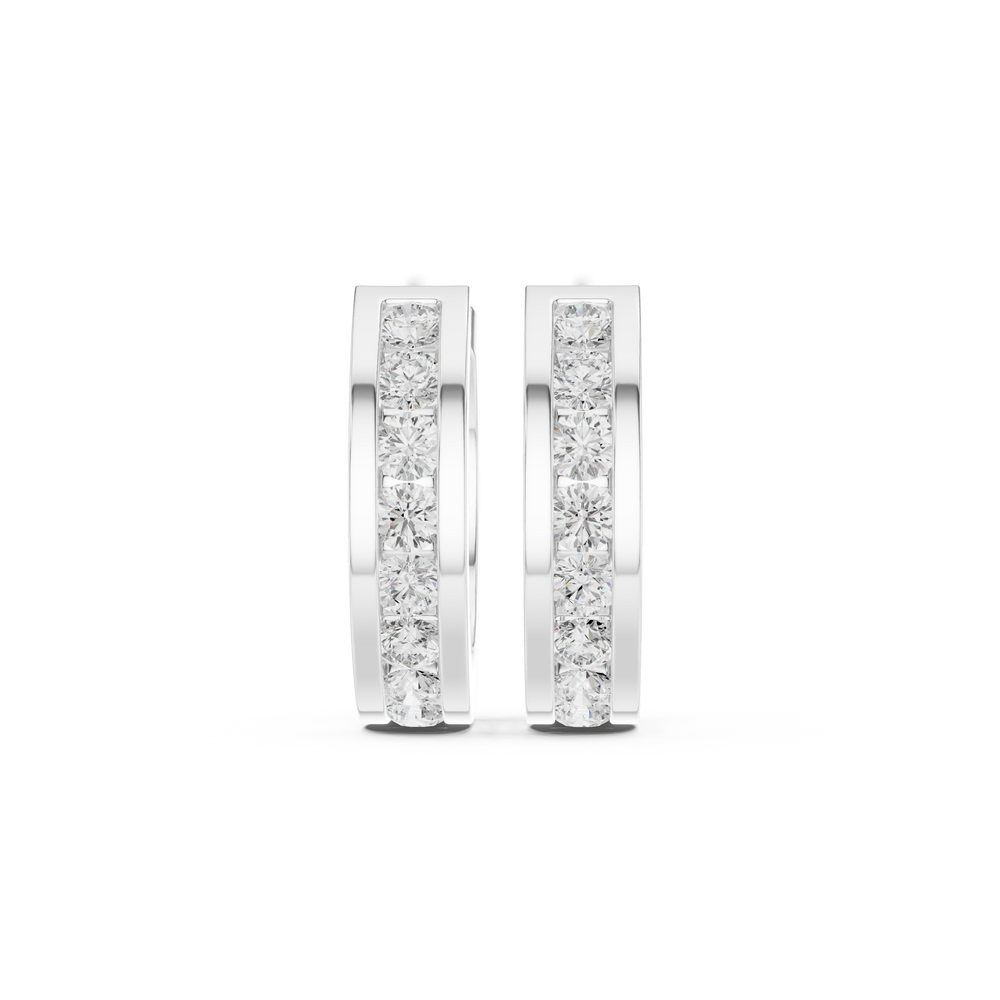 Channel set round stone huggie earrings with wide polished band and single row of channel set round stones along the centre