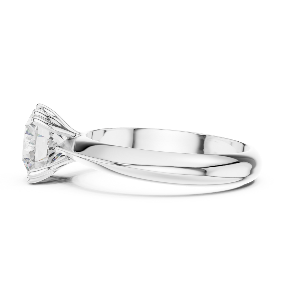 Classic round solitaire engagement ring with six prong cathedral setting and plain tapered band