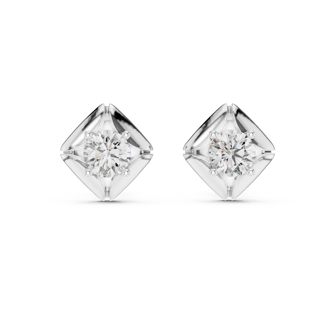 Round brilliant solitaire stud earrings within a polished cushion-shaped frame with grooved corner detailing