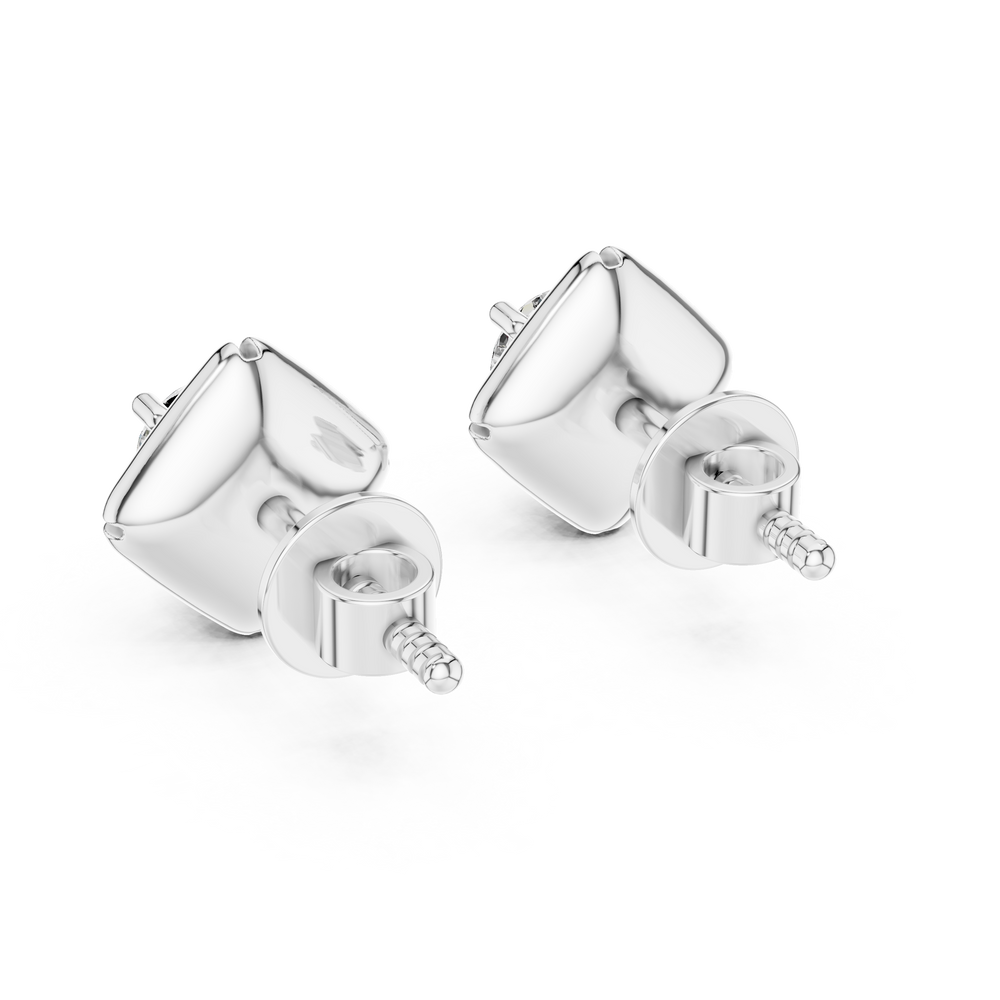 Round brilliant solitaire stud earrings within a polished cushion-shaped frame with grooved corner detailing