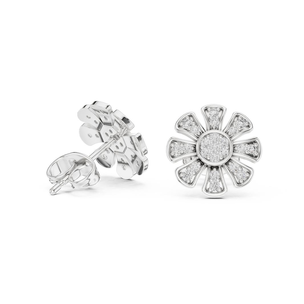 Daisy-inspired stud earrings with a round brilliant cluster centre and stone-set tapered petal segments radiating outward