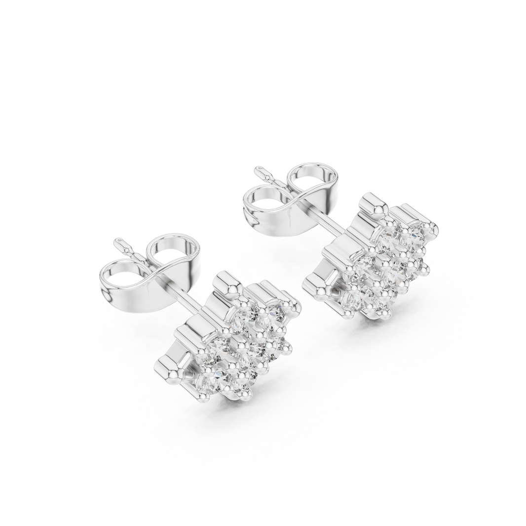 Diamond shape princess cluster stud earrings with marquise and round stones in a tilted square illusion cluster with bead tip corners