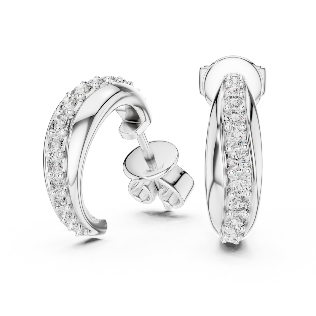 Huggie hoop earrings with a stone-set inner band and a polished outer band intertwined together