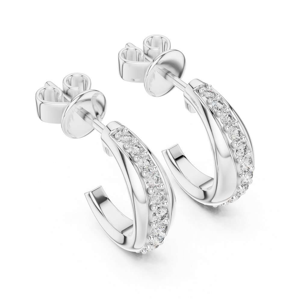 Huggie hoop earrings with a stone-set inner band and a polished outer band intertwined together
