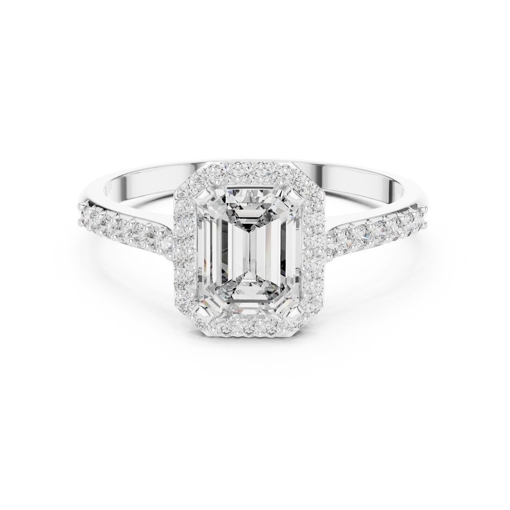 Emerald cut halo engagement ring with pave set shoulders and tapered split band