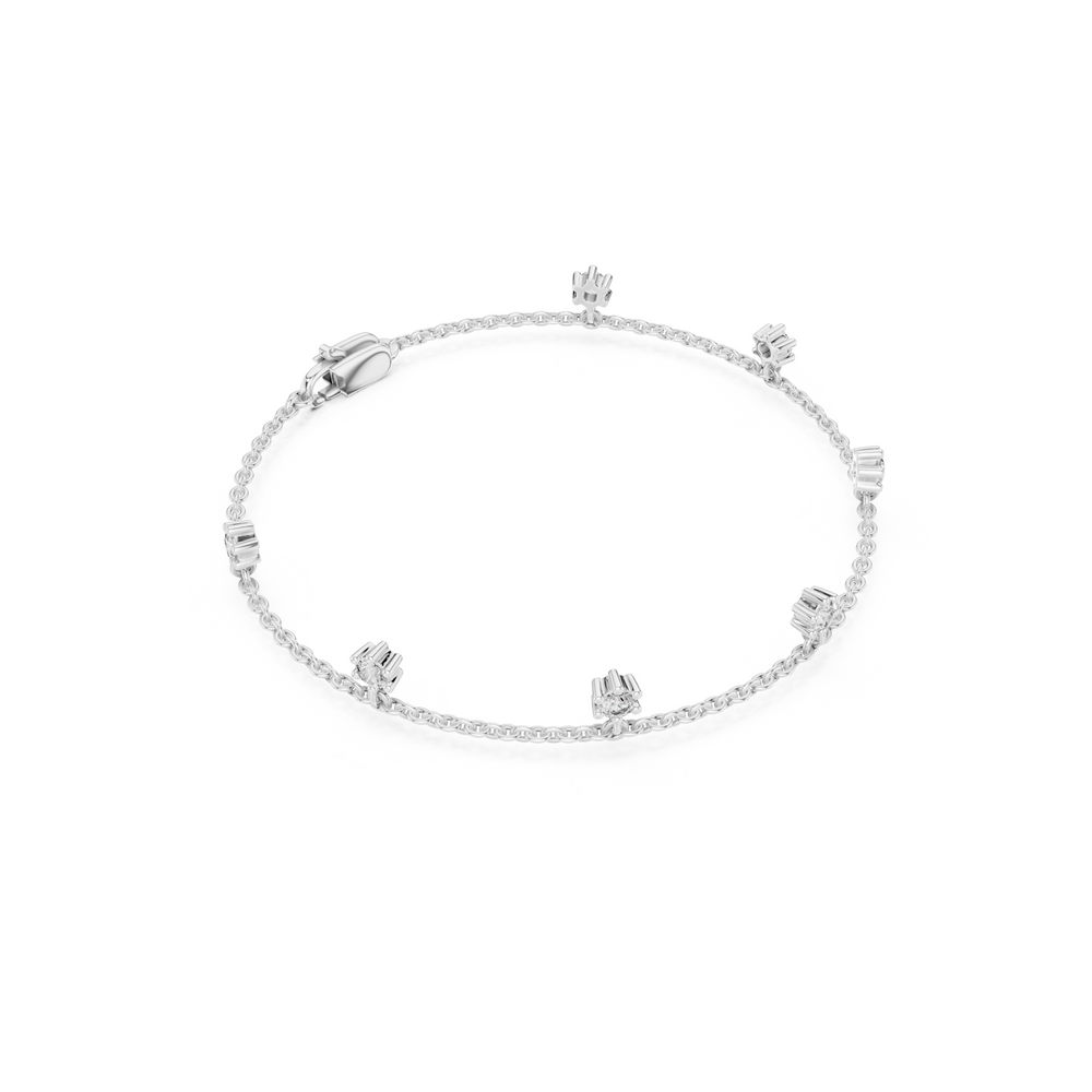 Floating station charm bracelet with prong set round stone station detailing