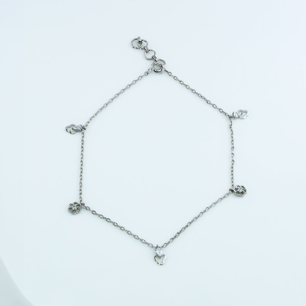 Floral and pear drop charm anklet with delicate chain and alternating flower and pear shaped dangling charms
