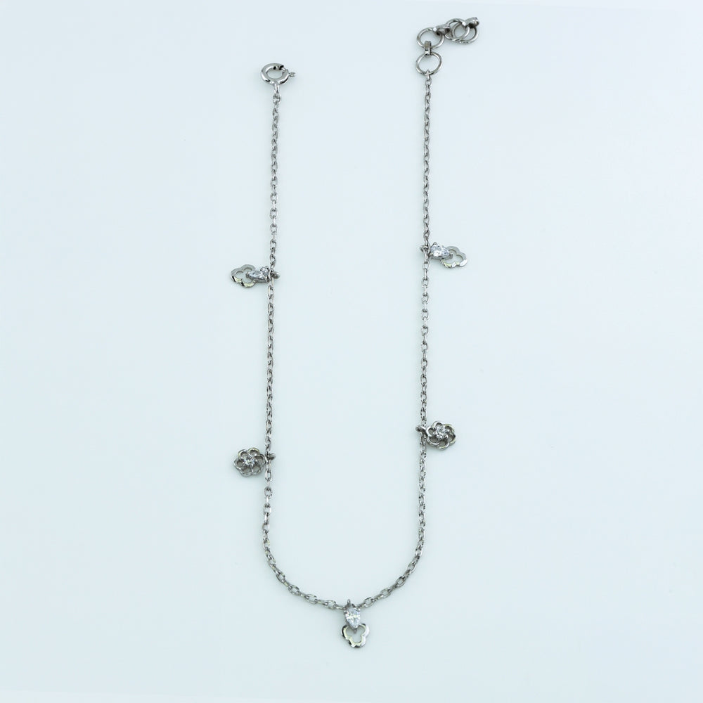 Floral and pear drop charm anklet with delicate chain and alternating flower and pear shaped dangling charms
