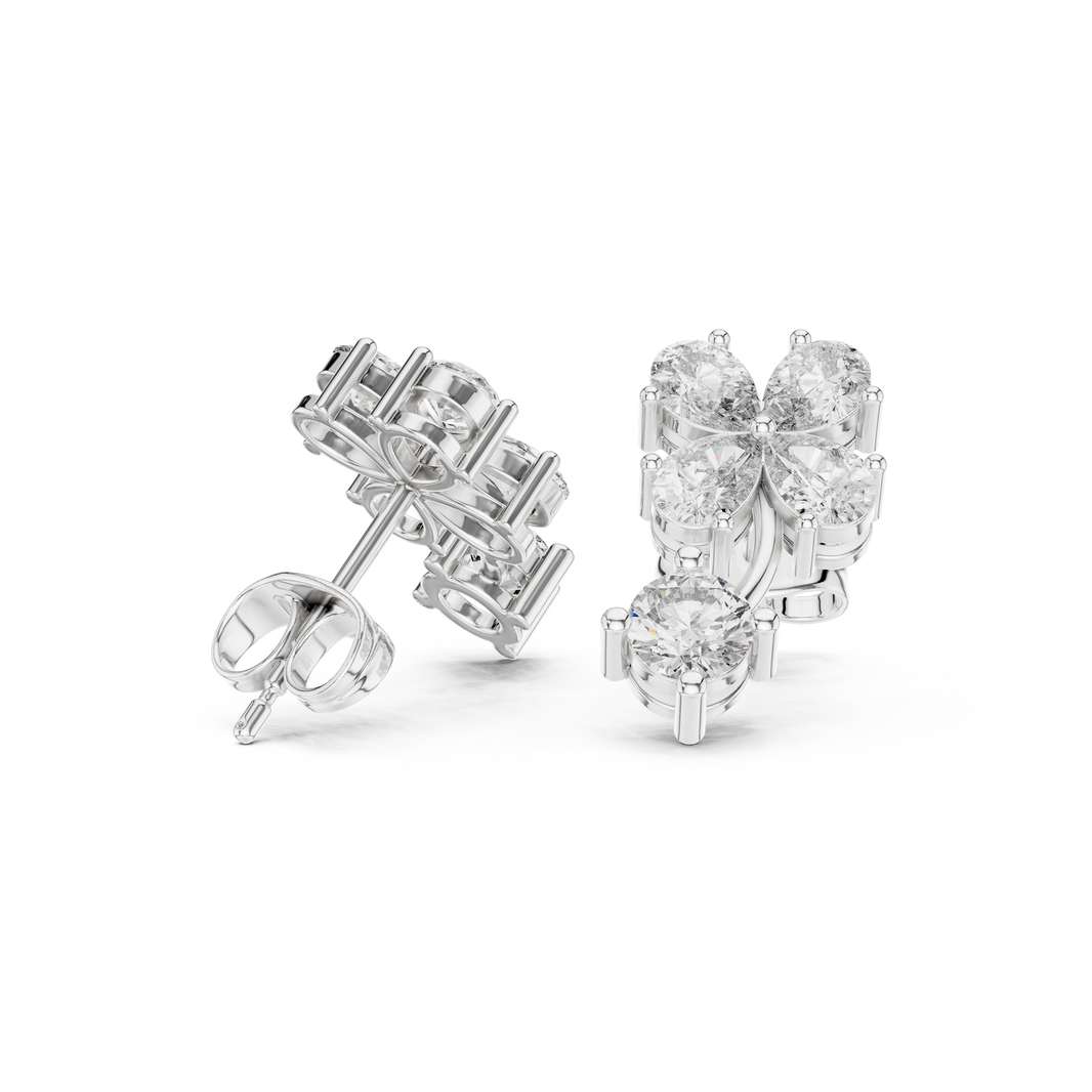 Floral cluster solitaire drop earrings with pear and round stone flower cluster top and large round solitaire drop on curved stem