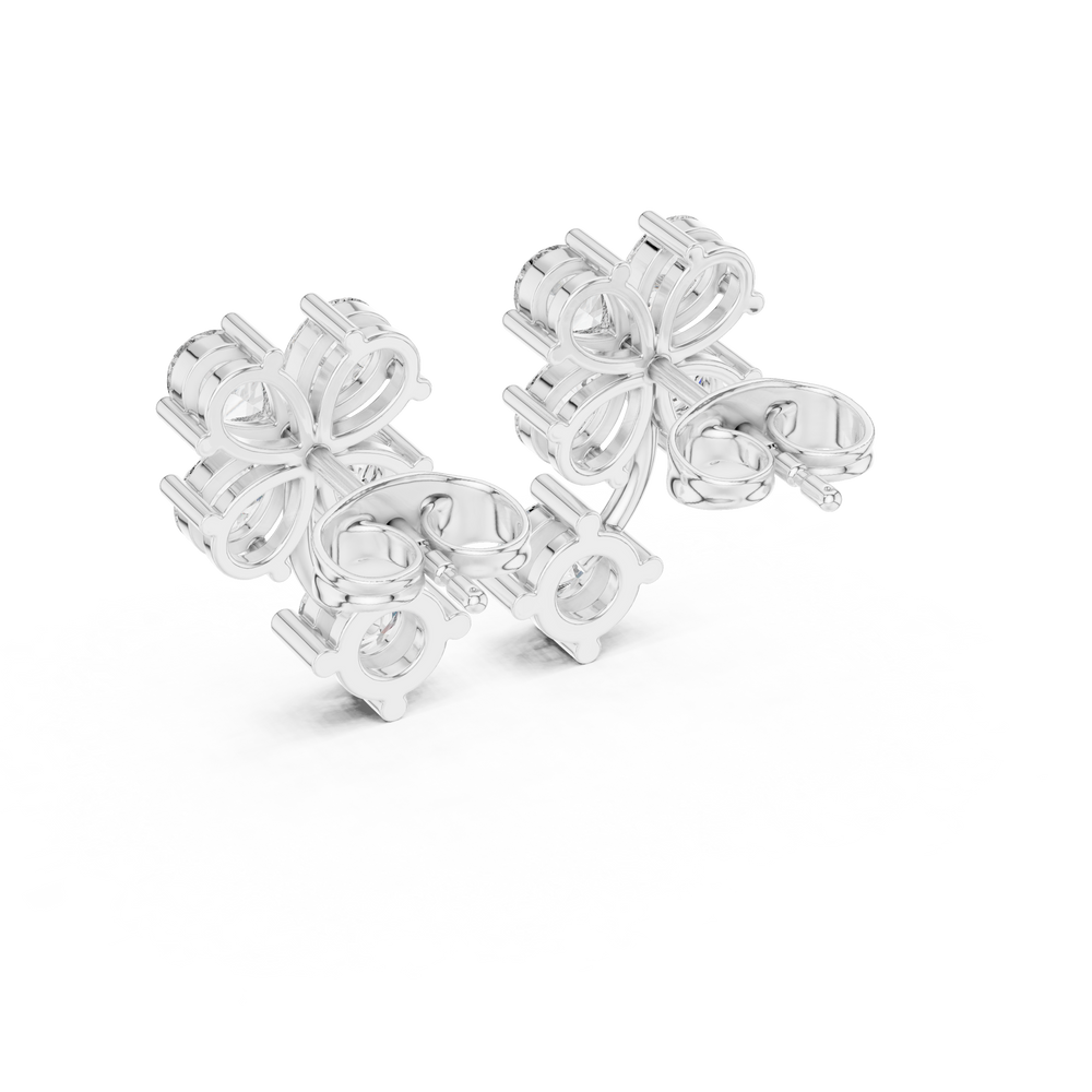 Floral cluster solitaire drop earrings with pear and round stone flower cluster top and large round solitaire drop on curved stem