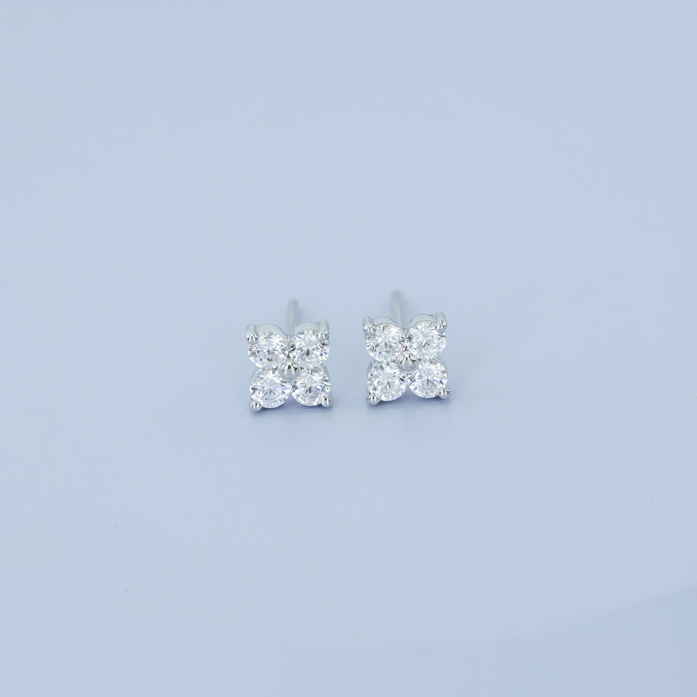 Floral diamond stud earrings with five round stones in flower cluster arrangement