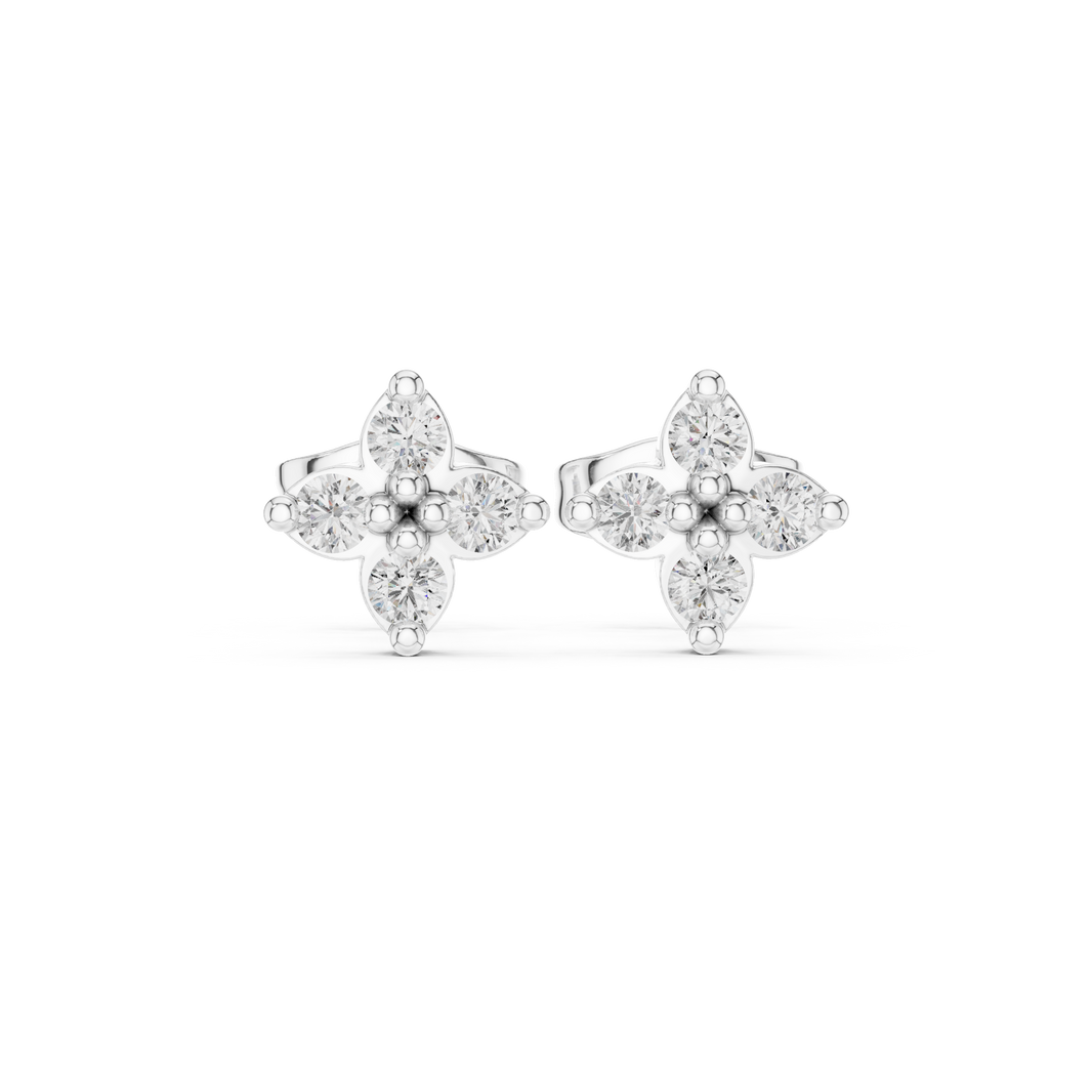 Four petal floral cluster stud earrings with round stones in a pointed petal flower design
