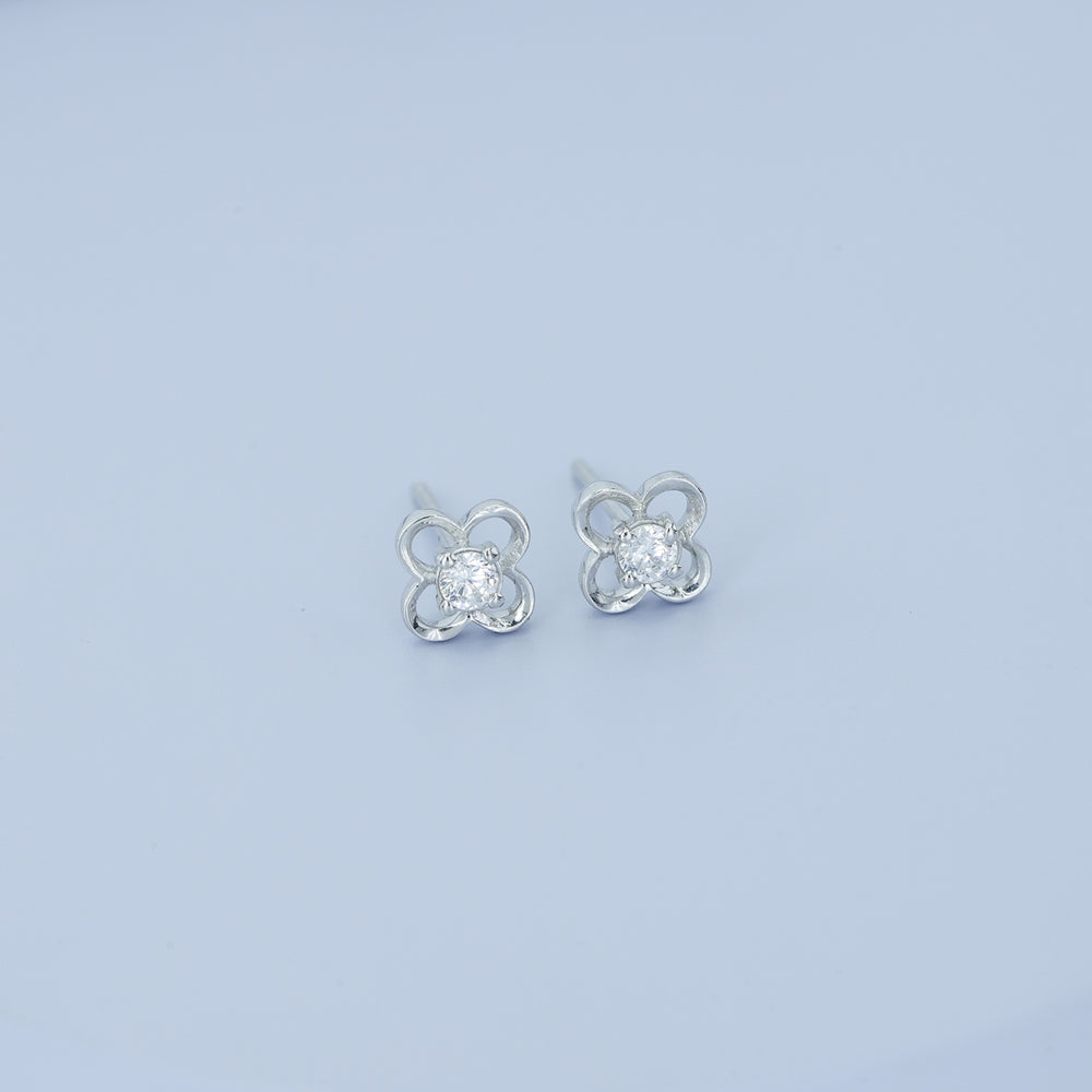 Four petal floral stud earrings with round raised centre and open petal frame