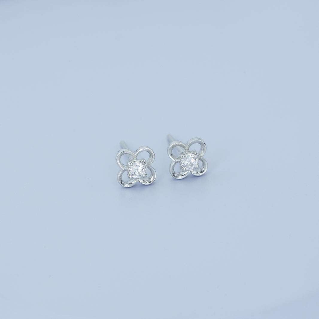 Four petal floral stud earrings with round raised centre and open petal frame