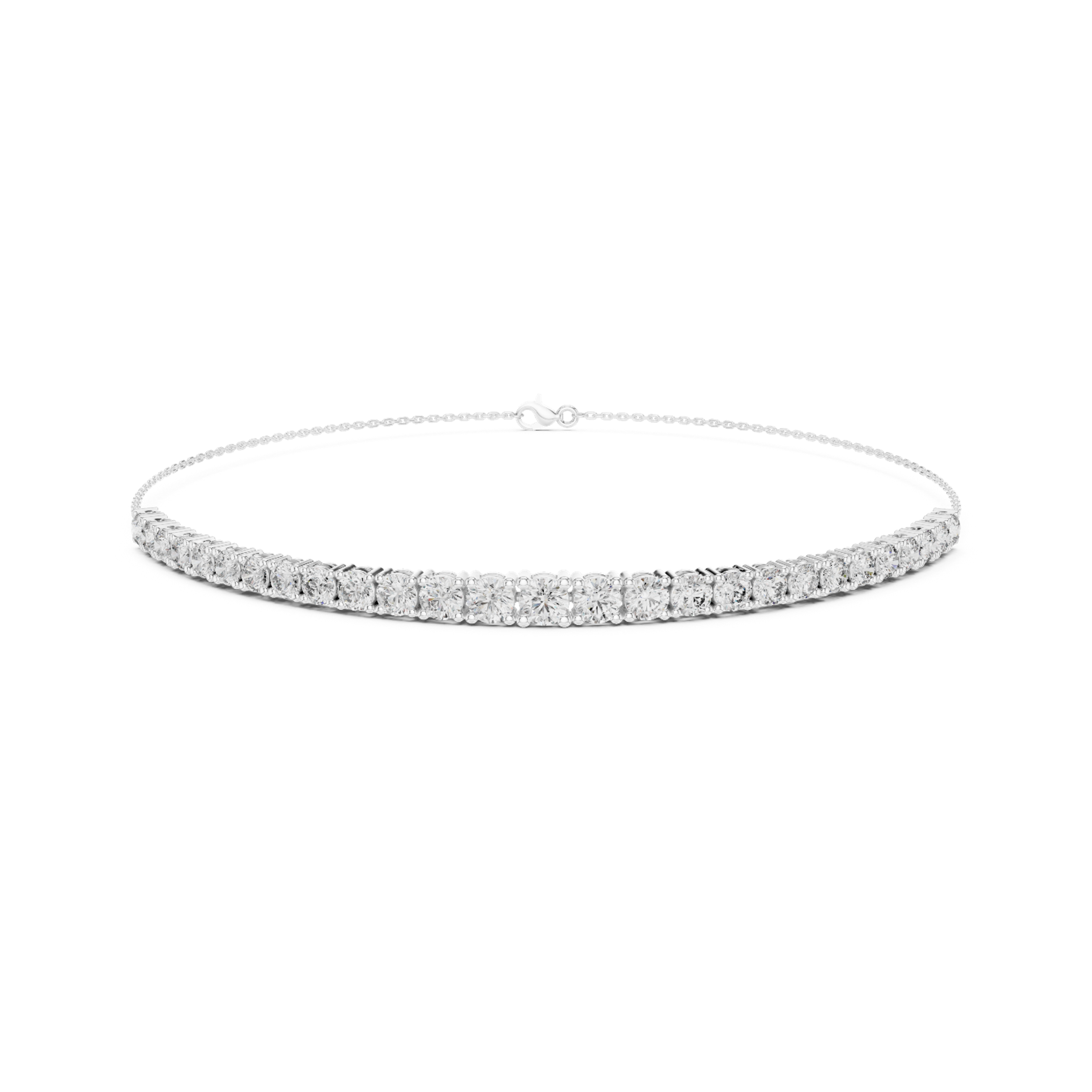 Graduating cluster chain bracelet with baguette and round stone centre detailing