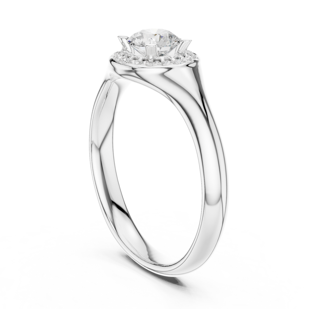 Halo solitaire engagement ring with pave set surround and plain polished band