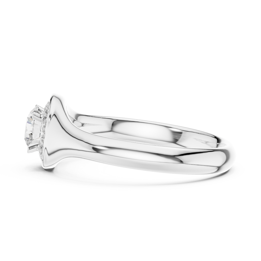 Halo solitaire engagement ring with pave set surround and plain polished band