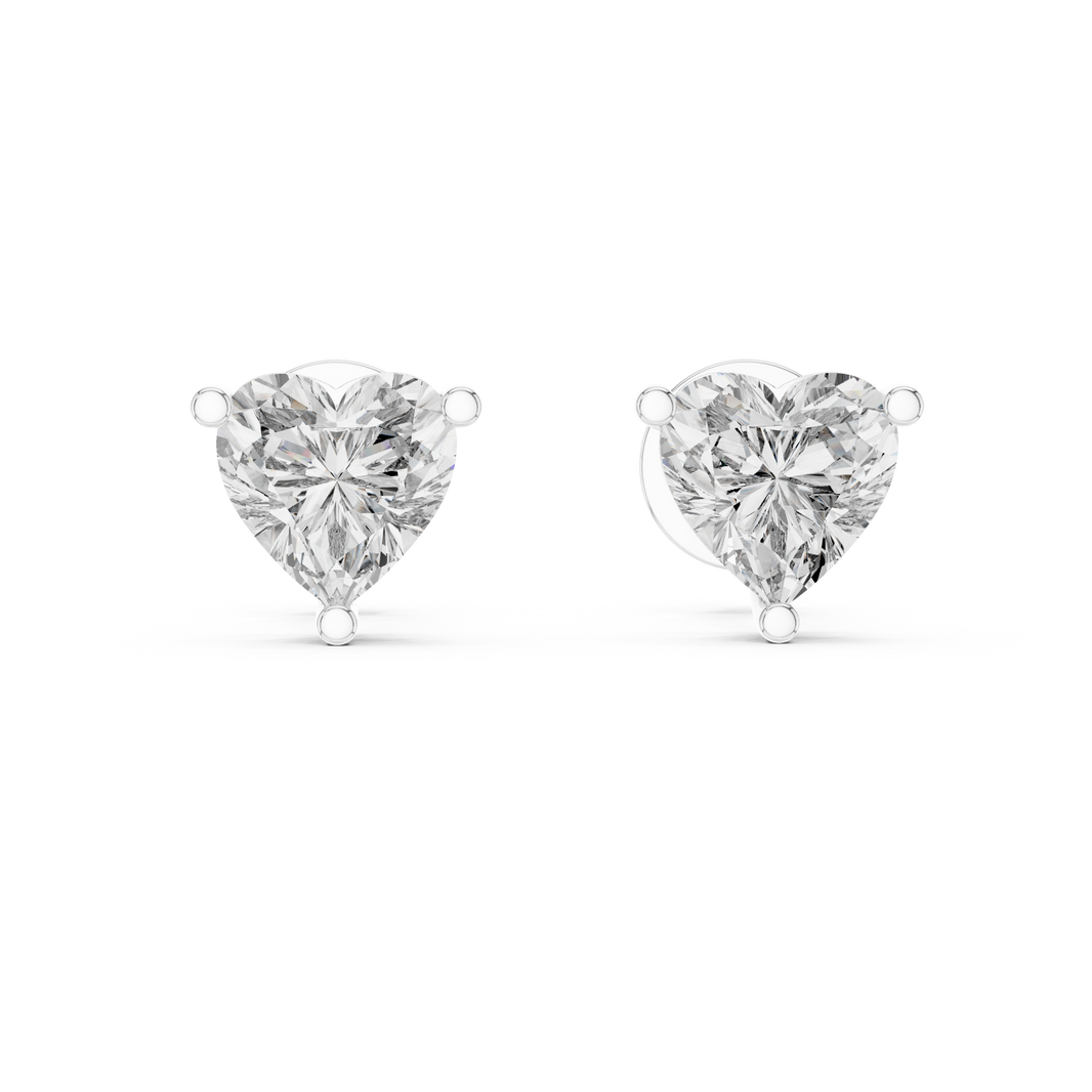 Heart cut solitaire stud earrings with a three-claw setting
