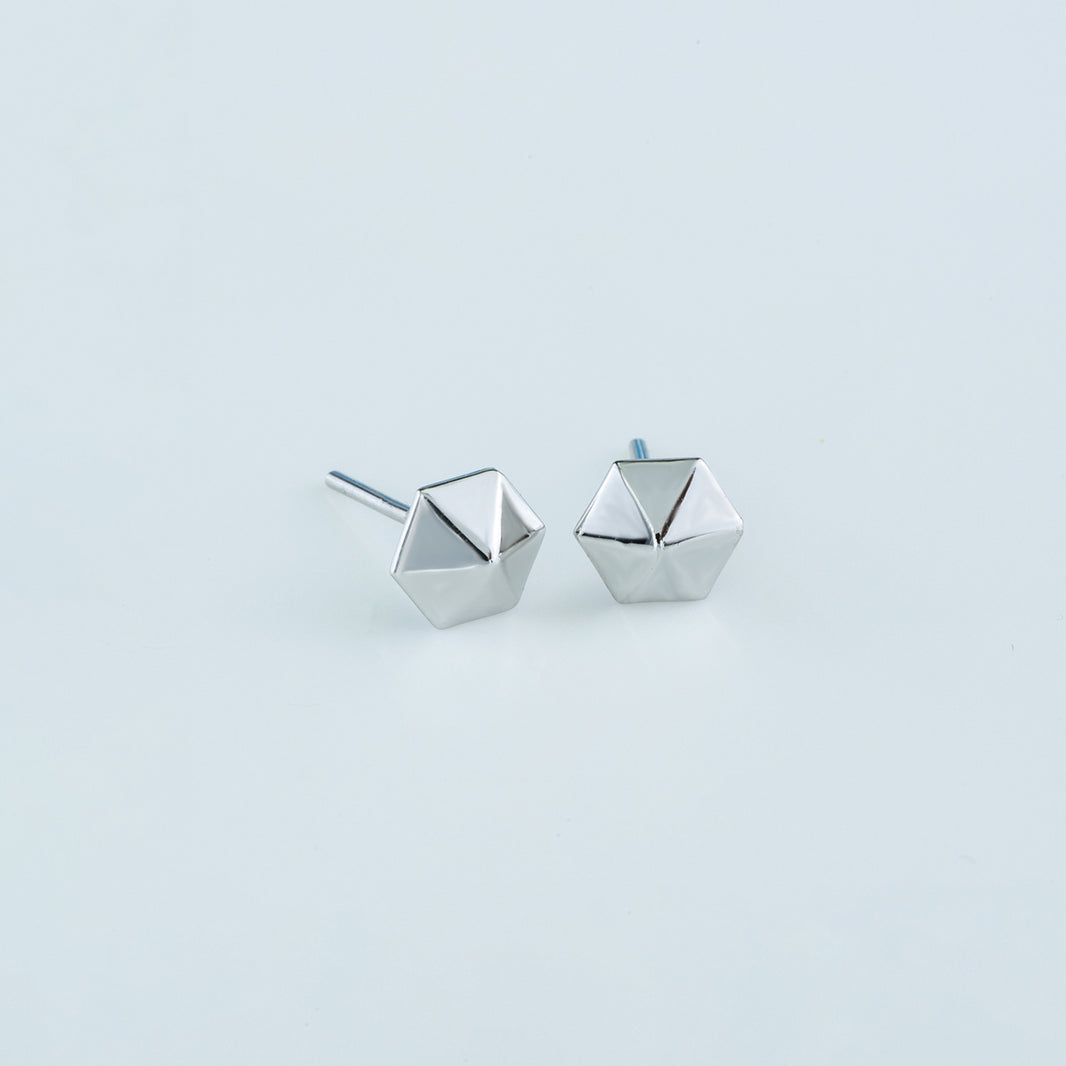 Hexa pyramid stud earrings with hexagonal base and multi-faceted geometric peak