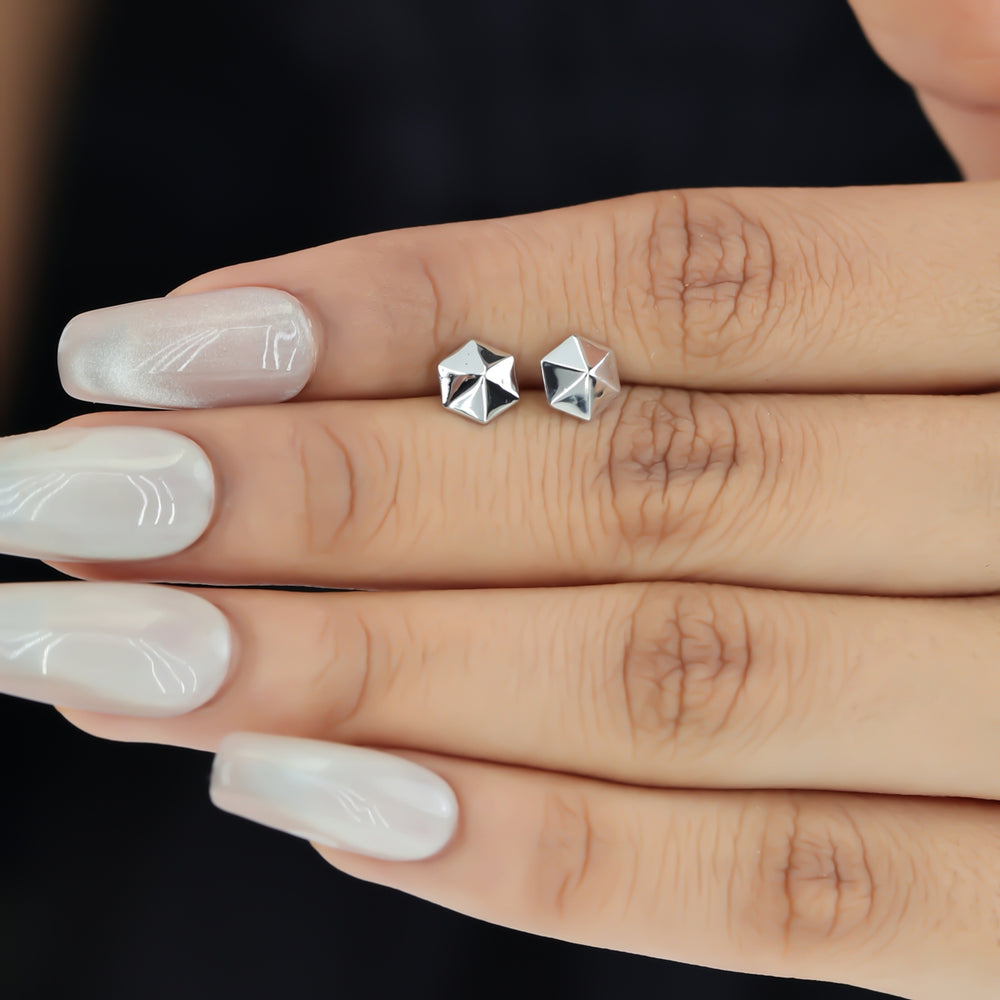 Hexa pyramid stud earrings with hexagonal base and multi-faceted geometric peak