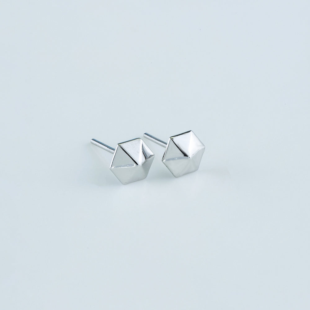 Hexa pyramid stud earrings with hexagonal base and multi-faceted geometric peak