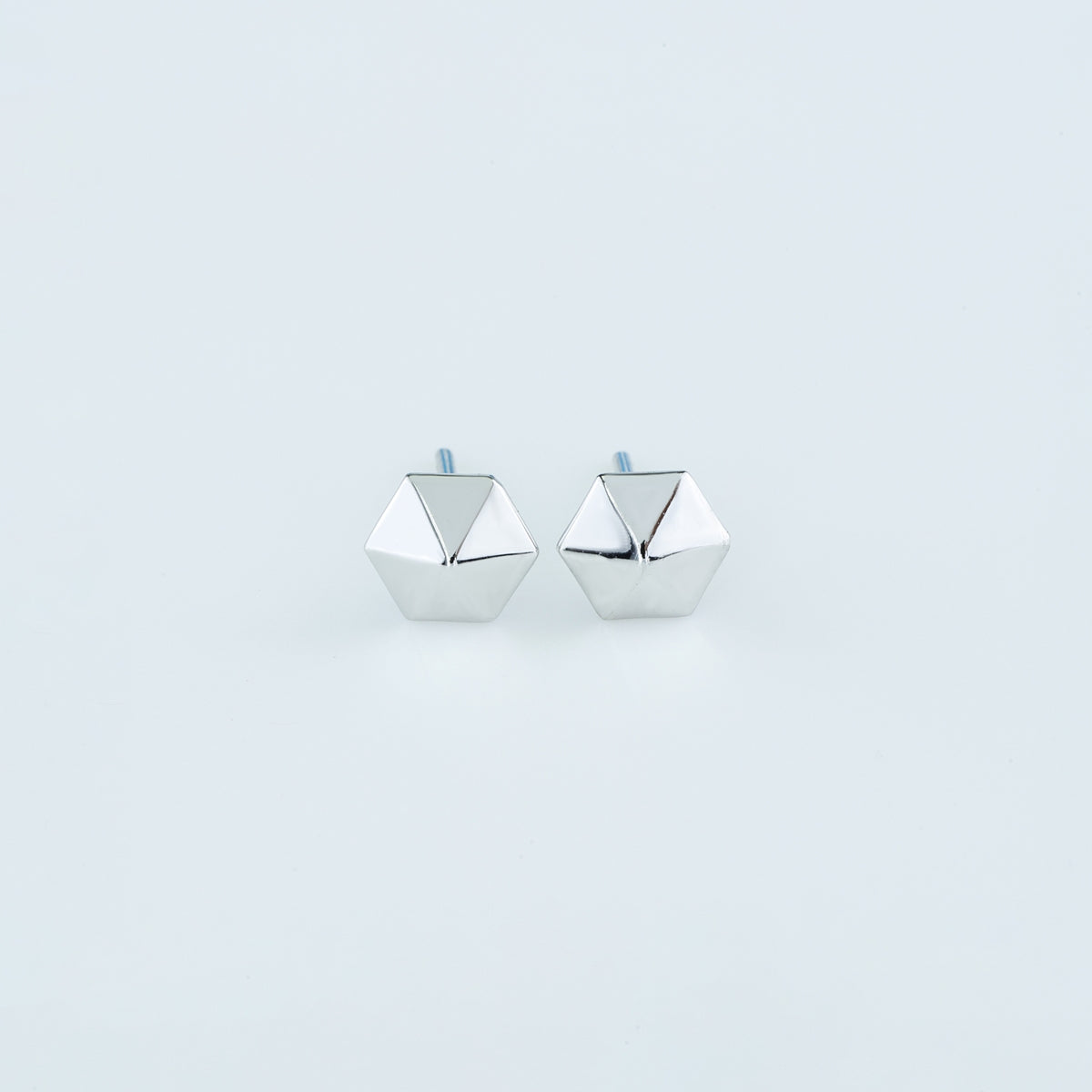 Hexa pyramid stud earrings with hexagonal base and multi-faceted geometric peak