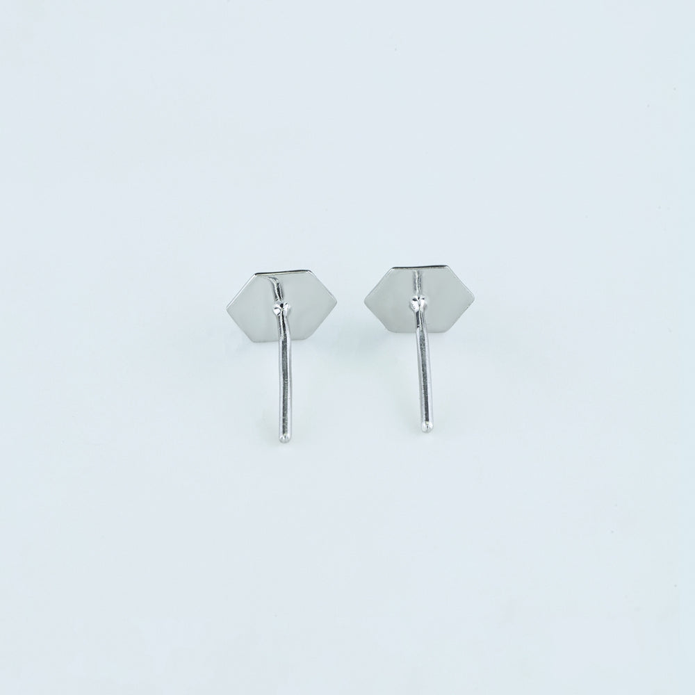 Hexa pyramid stud earrings with hexagonal base and multi-faceted geometric peak