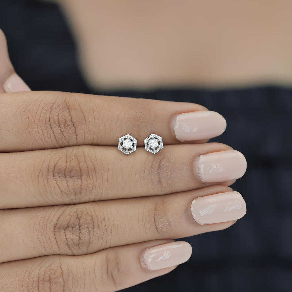 Hexagon stud earrings with geometric frame and raised round centre