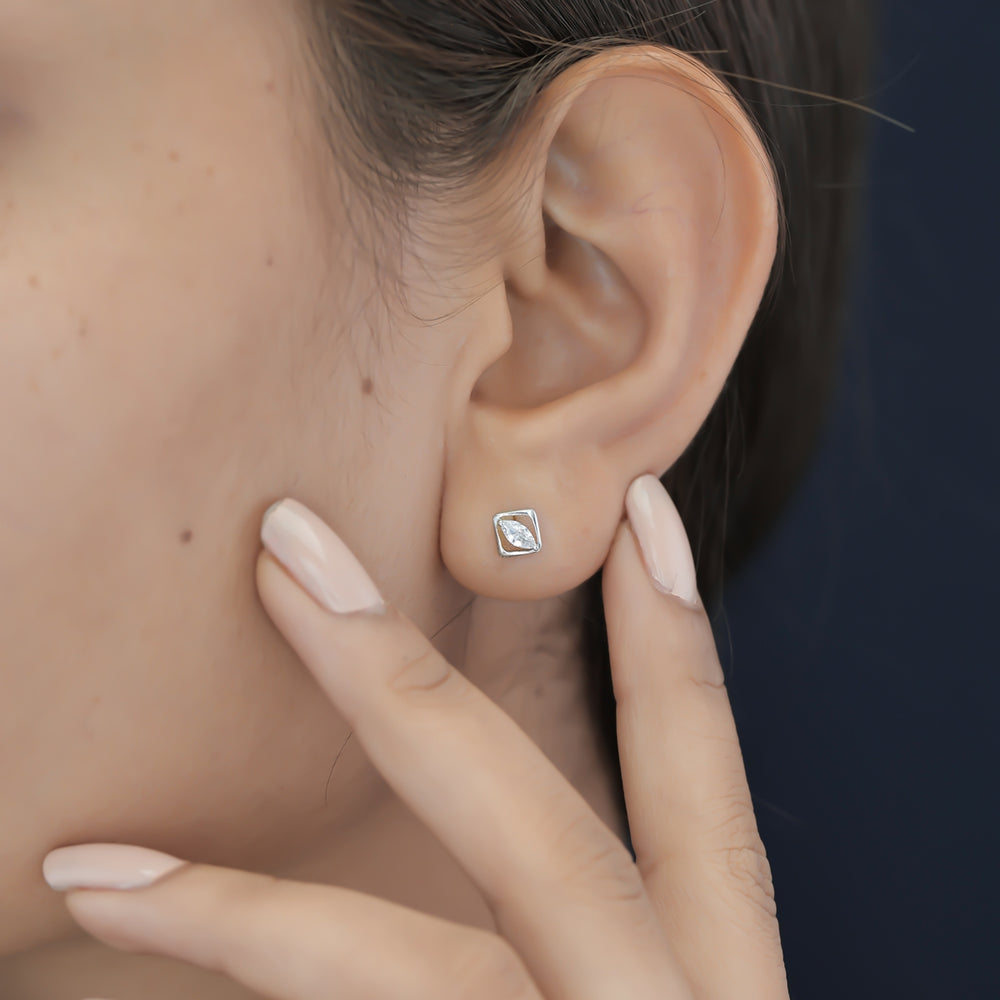 Marquise stud earrings with tilted square open frame border