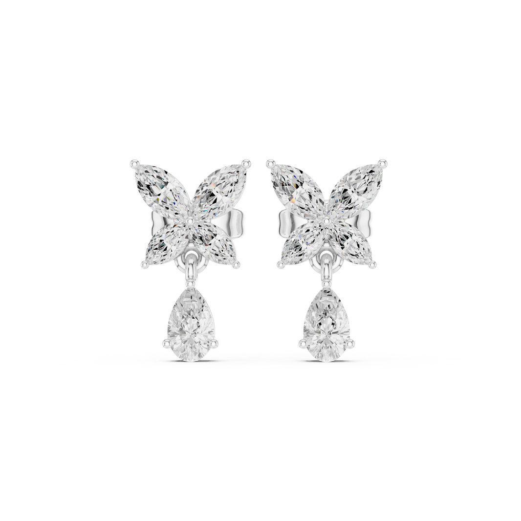 Four-marquise butterfly flower cluster top with a dangling pear solitaire drop below