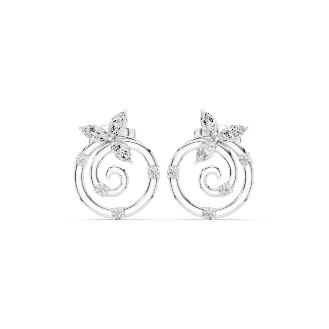 Marquise stone floral cluster top with a polished spiral circle and scattered round stone accents