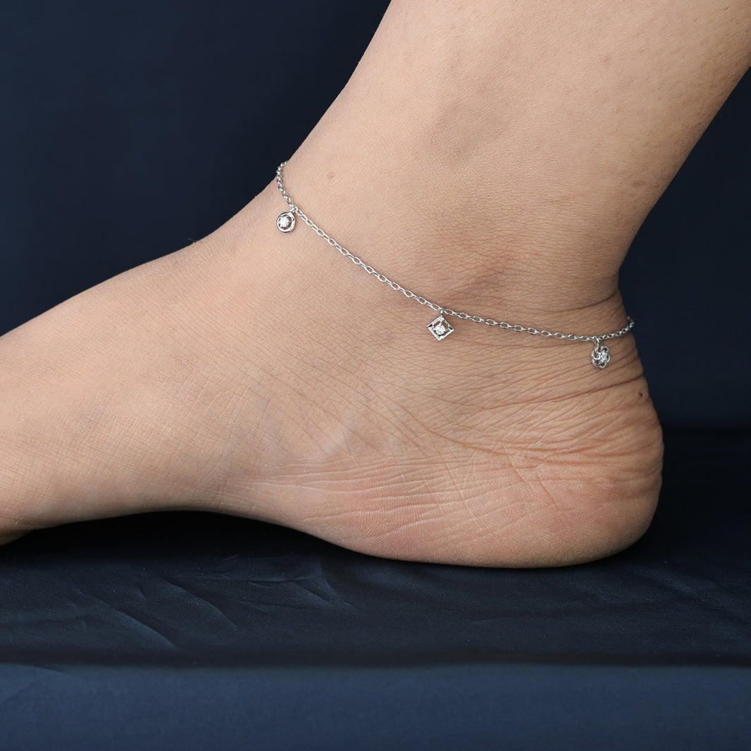 Mixed shape charm anklet with delicate chain and five varied geometric round stone station charms