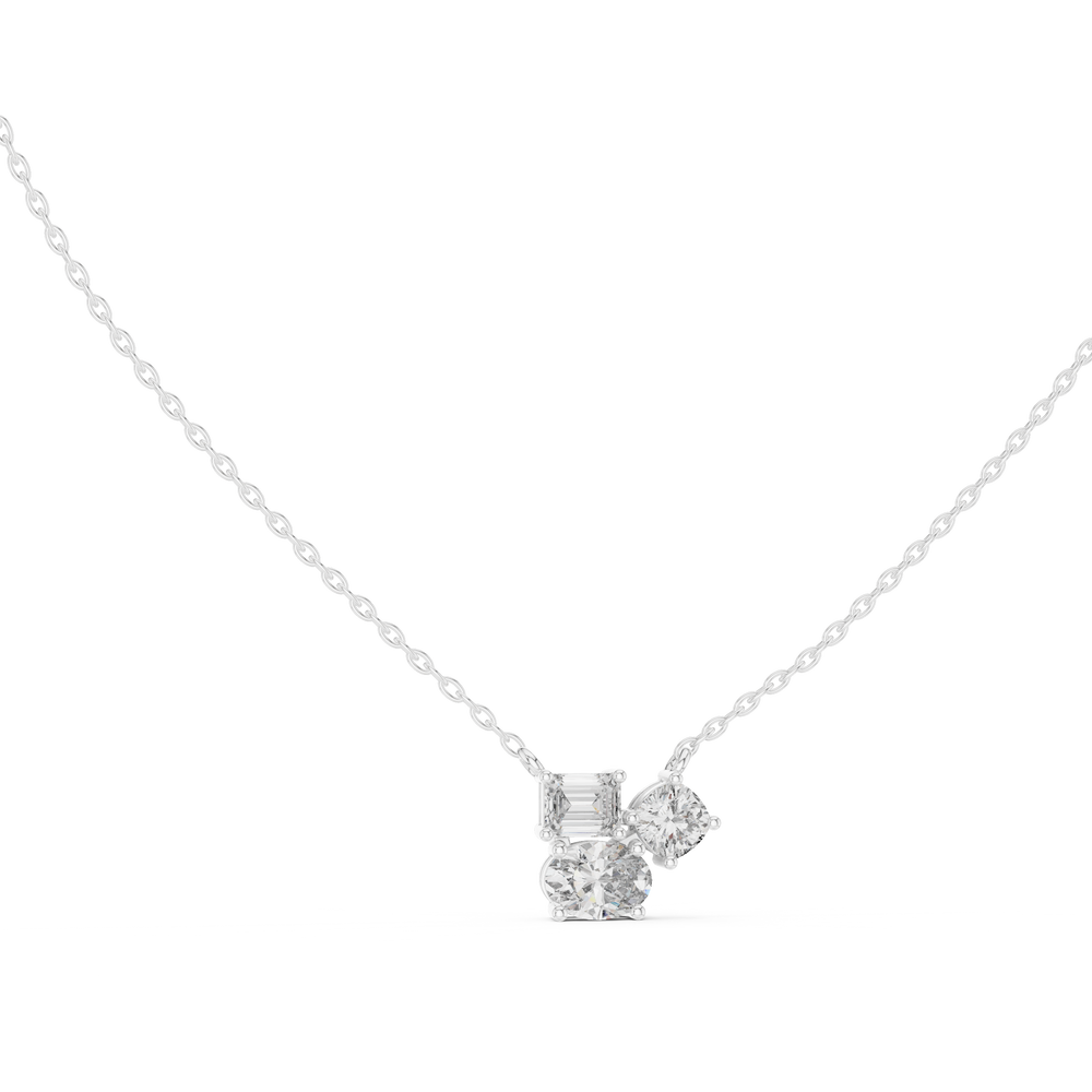 Multi shape cluster diamond pendant necklace with emerald, round and cushion cut stones