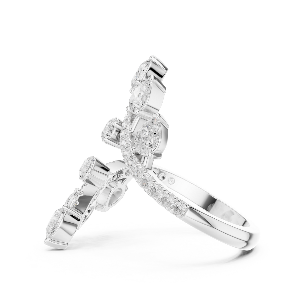 Multi stone floral bypass ring with scattered pear and pave set open band