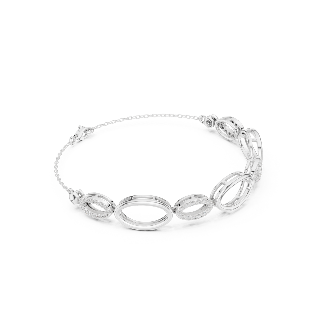 Oval link chain bracelet with open and pave set stone detailing