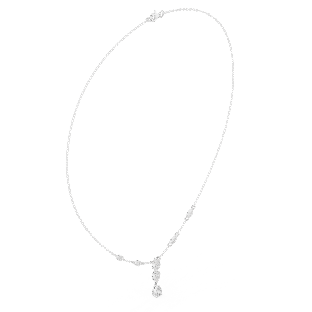 Pear and marquise diamond drop station necklace with bezel set chain accents