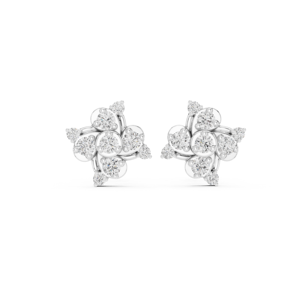 Pinwheel floral cluster stud earrings with three bezel set round stones in swirling pinwheel arrangement with pear stone accents