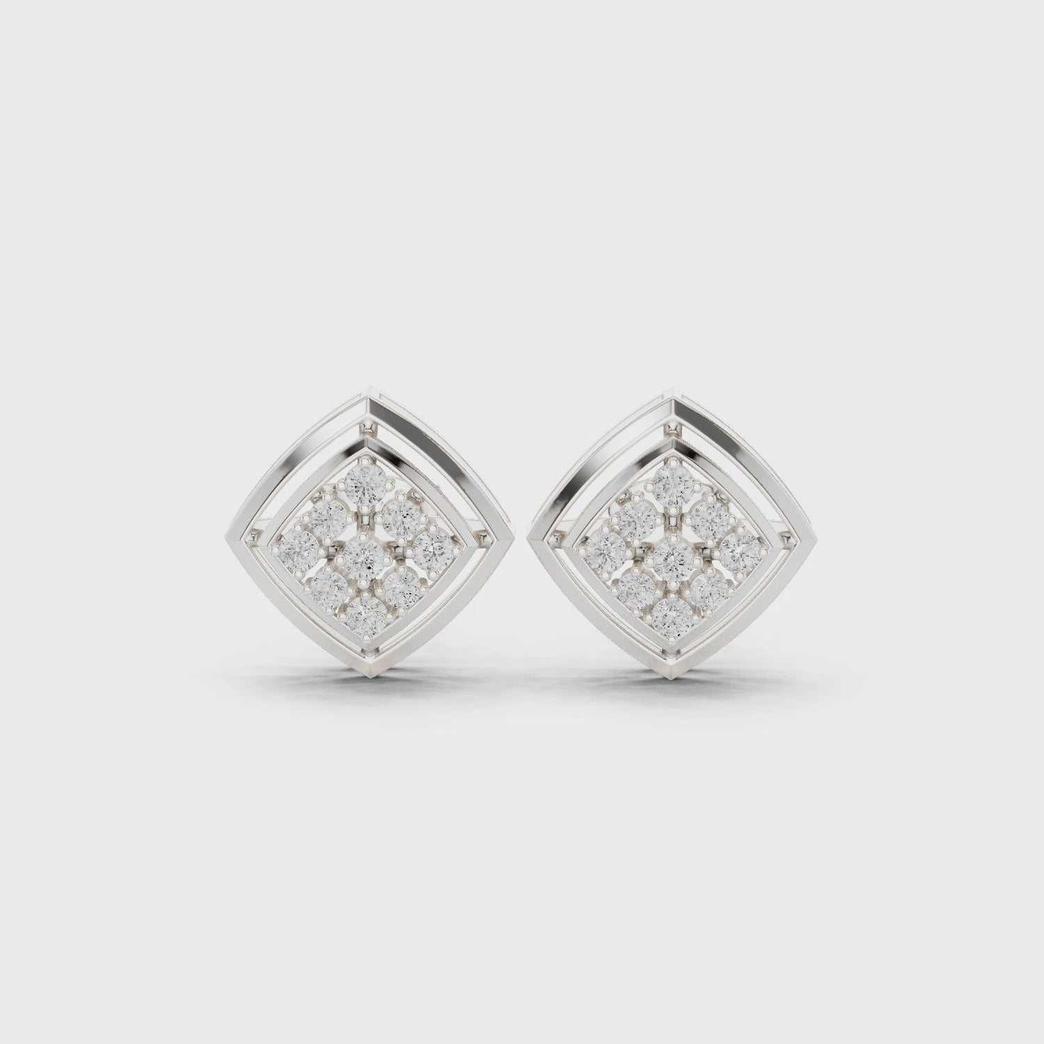 Grid pattern baguette cluster stud earrings with open bar detailing