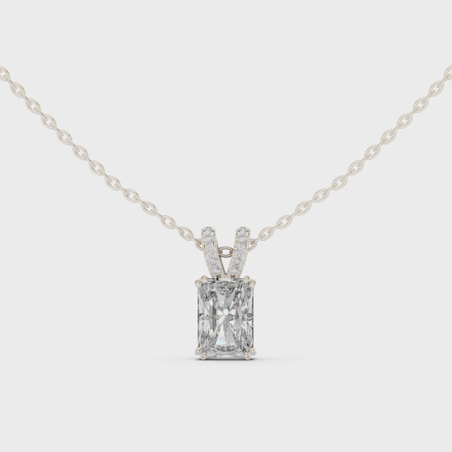 Radiant cut solitaire diamond pendant necklace with pave bail setting