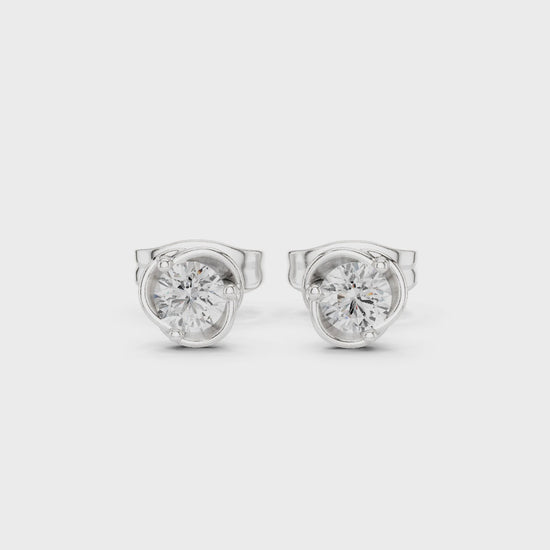Elegant round solitaire stud earrings with classic bezel setting