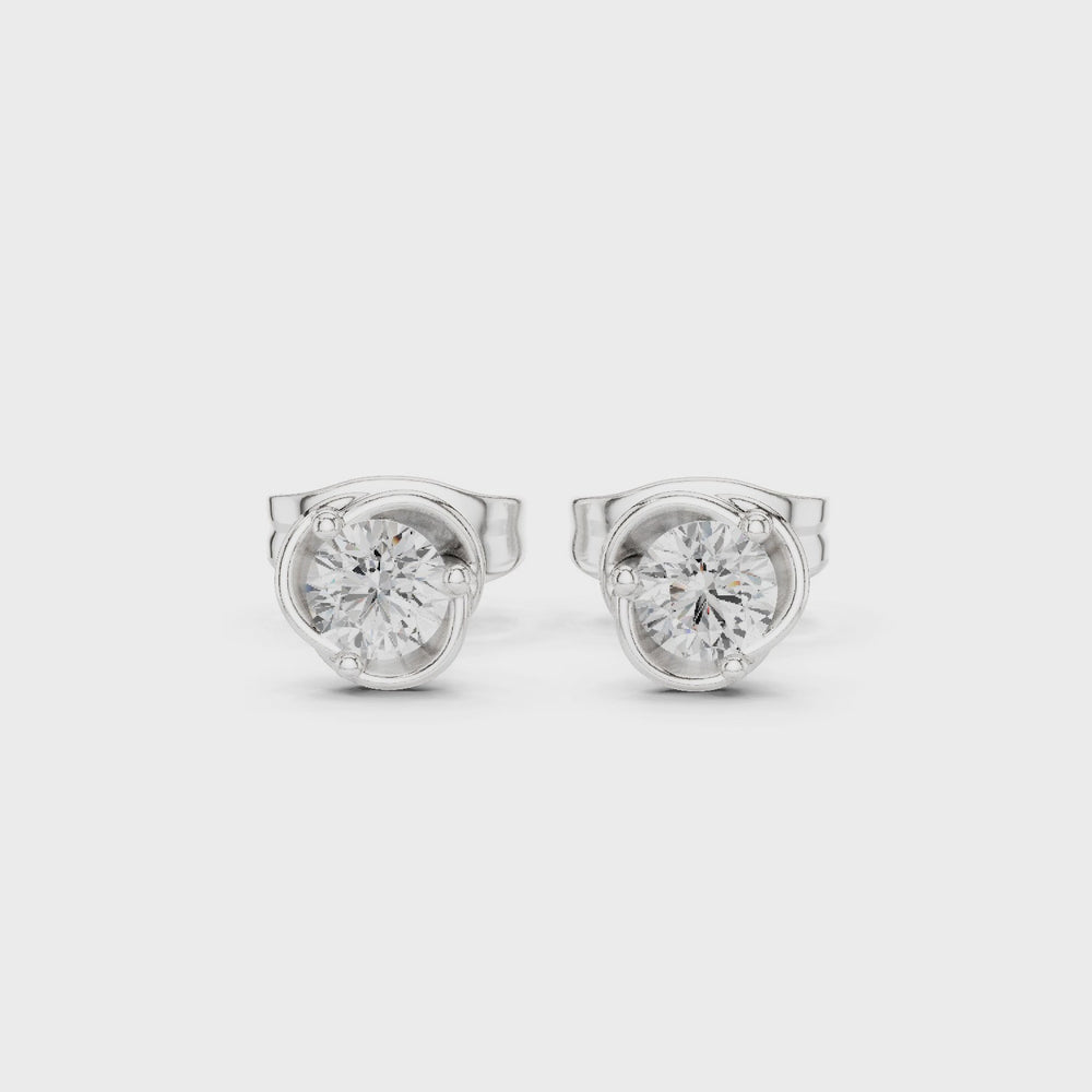 Elegant round solitaire stud earrings with classic bezel setting