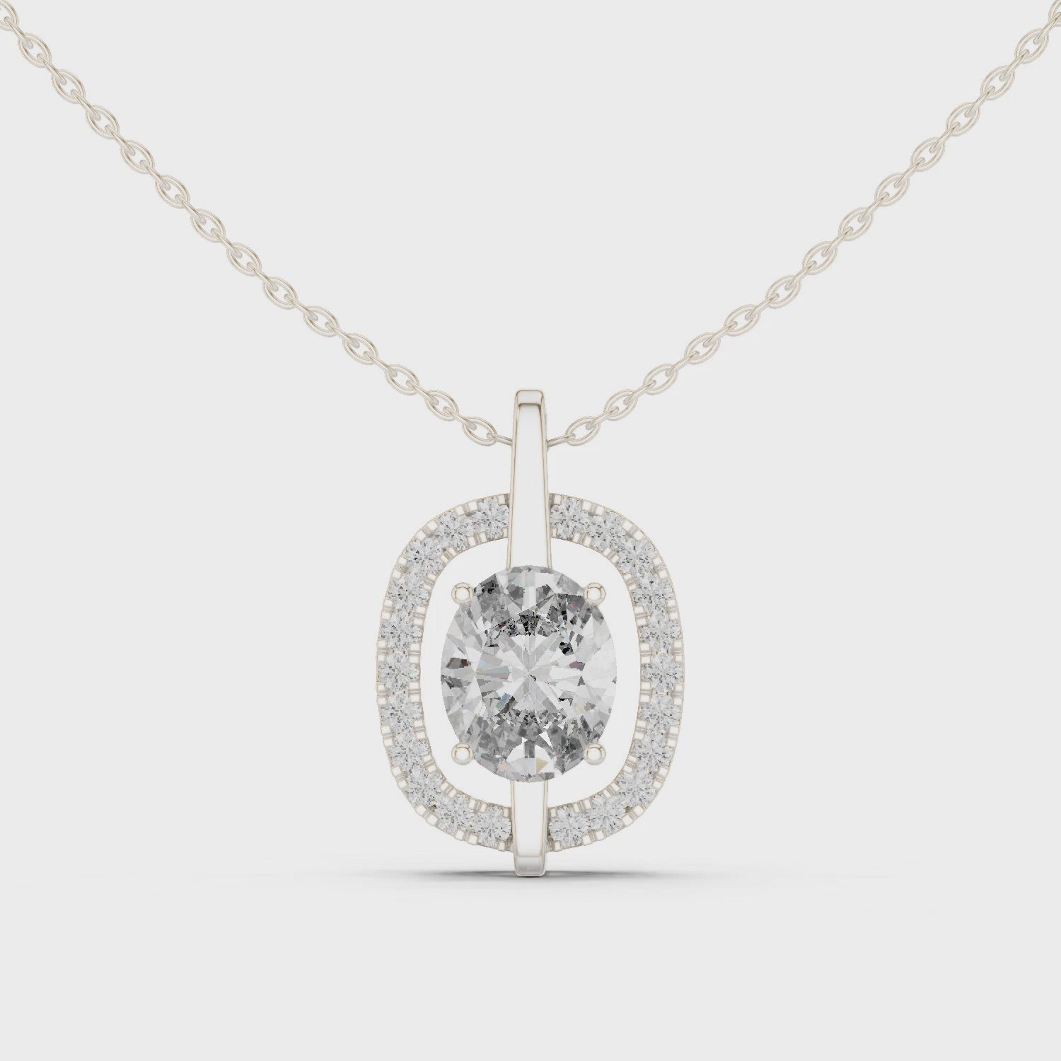Oval halo pave diamond pendant necklace with round brilliant solitaire centre stone
