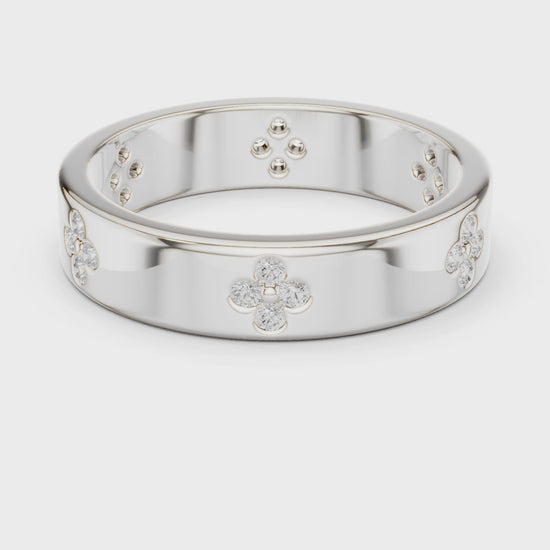 Floral motif diamond band ring with four petal cluster design all around