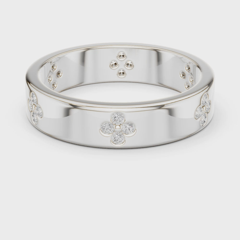 Floral motif diamond band ring with four petal cluster design all around