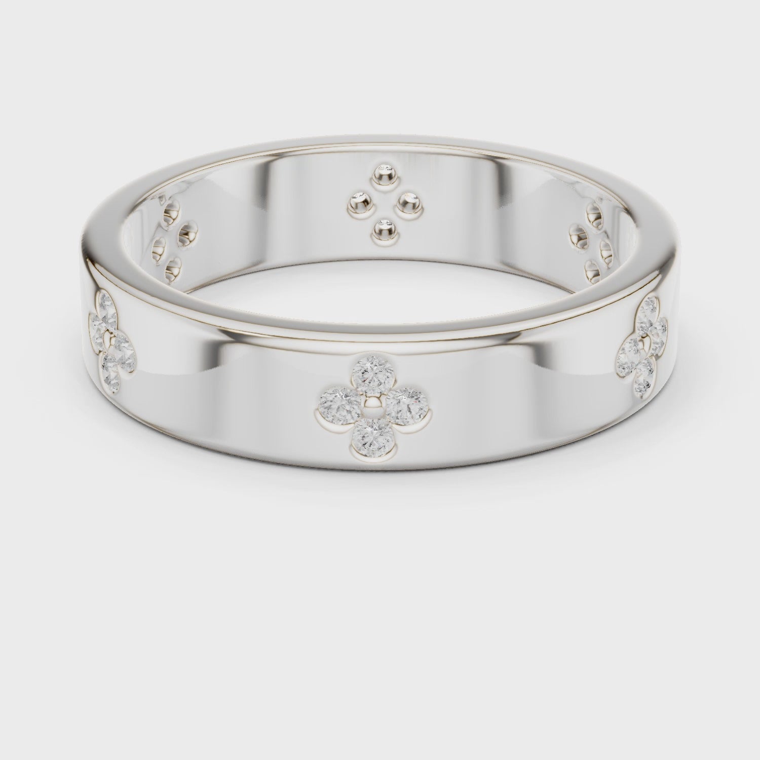 Floral motif diamond band ring with four petal cluster design all around