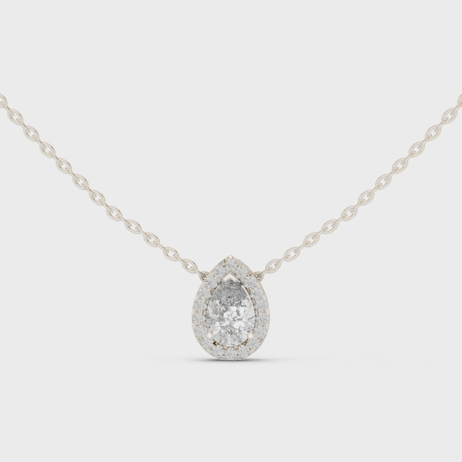 Pear cut bezel set solitaire diamond pendant necklace